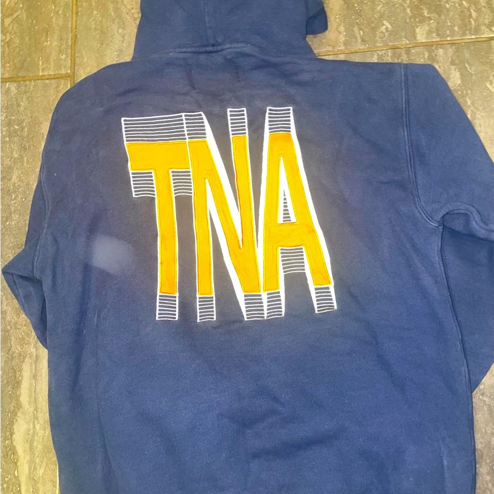 TNA logo cozy sweater